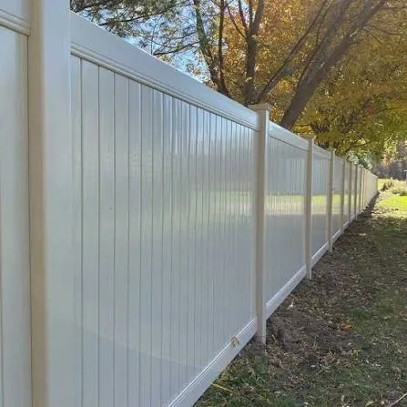 White vinyl fence with matching posts
